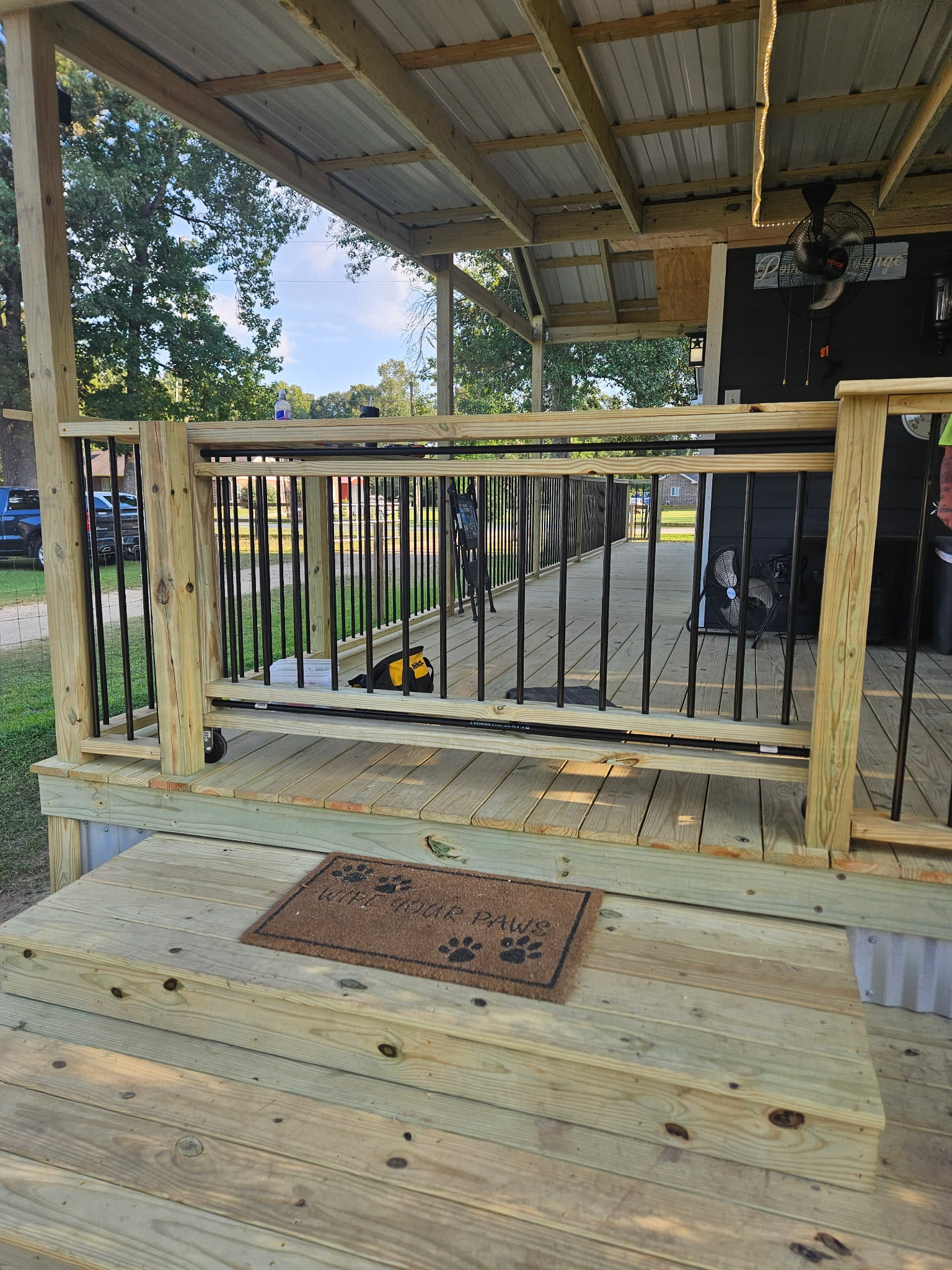 A covered deck completed by Zach Of All Trades in Tarkington, TX